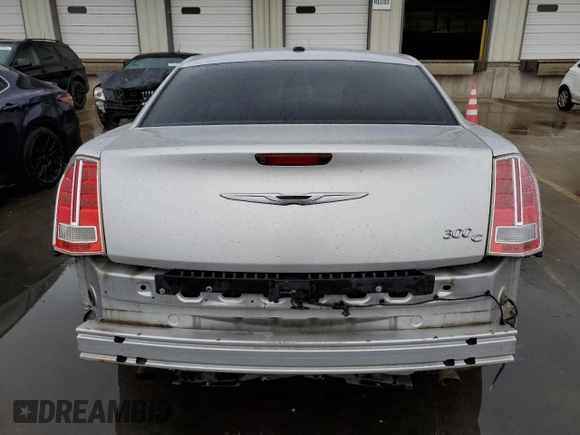 2012 Chrysler 300 with VIN 2C3CCAET5CH288759, listed as a Copart auction lot 83869294 with 100,575 mi miles and Salvage Title. Bid and sale history available at carsss.com. Image 6.