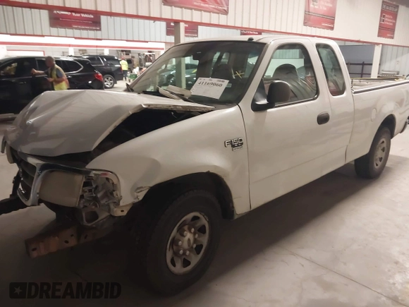 2001 Ford F-150 XL with VIN 1FTPX17L31NB27121, listed as a IAAI auction lot 41169060 with 247,389 mi miles and . Bid and sale history available at DreamBid. Image 2.
