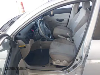2007 Hyundai Accent GLS with VIN KMHCN46C27U138872, listed as a IAAI auction lot 42144670 with 81,260 mi miles. Bid and sale history available at carsss.com. Image 5.
