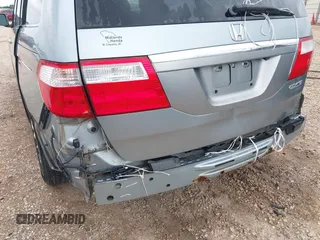 2005 Honda Odyssey Touring с VIN 5FNRL38805B120917, выставлен на аукционе IAAI как лот 42396531 с пробегом 267 626 миль миль и . История ставок и продаж доступна на DreamBid. Изображение 6.