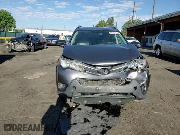 2015 Toyota RAV4 LE with VIN JTMBFREV7FJ049828, listed as a Copart auction lot 60457645 with 80,105 mi miles and Salvage title. Bid and sale history available at DreamBid. Image 13.