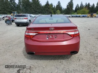 2012 Hyundai Azera z VIN KMHFH4JG3CA157800, wystawiony jako Copart lot #56370845 z przebiegiem 87 180 mil mil oraz Szkoda całkowita • Salvage title. Historia ofert i sprzedaży dostępna na DreamBid. Obrazek 6.