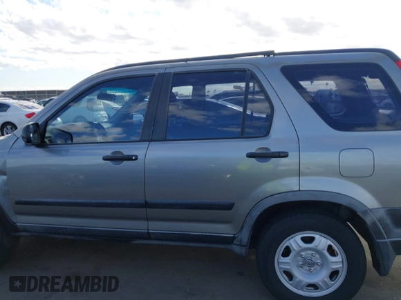 2006 Honda CR-V LX with VIN JHLRD68566C009990, listed as a IAAI auction lot 42024486 with 160,835 mi miles and . Bid and sale history available at DreamBid. Image 14.