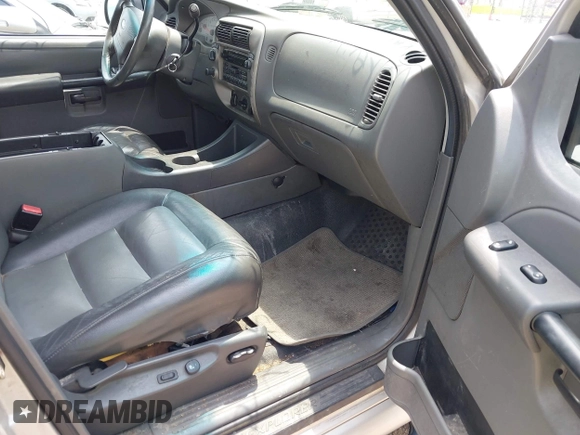 2004 Ford Explorer Sport Trac XLS with VIN 1FMZU77K74UB03292, listed as a IAAI auction lot 42447875 with 149,691 mi miles and . Bid and sale history available at DreamBid. Image 5.