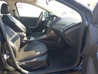 2014 Ford Focus Titanium with VIN 1FADP3J27EL227311, listed as a IAAI auction lot 41904675 with 180,459 mi miles. Bid and sale history available at carsss.com. Image 5.