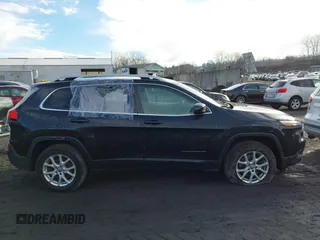 2016 Jeep Cherokee Latitude z VIN 1C4PJMCB6GW345413, wystawiony jako IAAI lot #41216995 z przebiegiem 254 311 mil mil oraz . Historia ofert i sprzedaży dostępna na DreamBid. Obrazek 13.