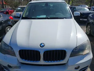 2011 BMW X5 35i with VIN 5UXZV4C58BL402047, listed as a IAAI auction lot 41837120 with 168,325 mi miles. Bid and sale history available at carsss.com. Image 6.