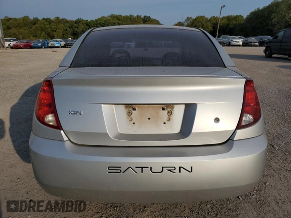 2004 Saturn ION ION 1 z VIN 1G8AG52F44Z127750, wystawiony jako Copart lot #75961964 z przebiegiem 104 567 mil mil oraz Szkoda całkowita • Salvage title. Historia ofert i sprzedaży dostępna na DreamBid. Obrazek 6.
