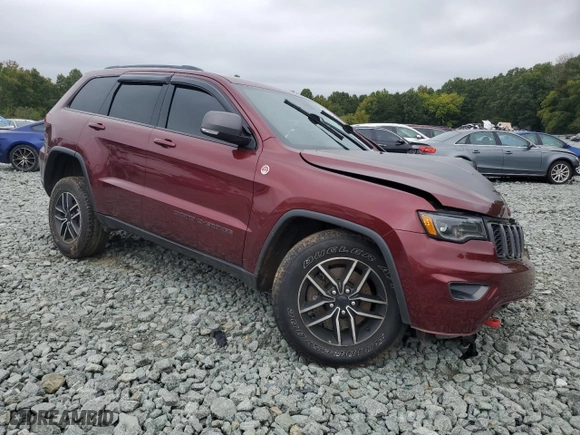 2019 Jeep Grand Cherokee Trailhawk with VIN 1C4RJFLT9KC718628, listed as a Copart auction lot 72646234 with 94,980 mi miles and Salvage Title. Bid and sale history available at carsss.com. Image 4.
