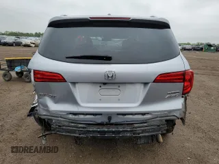 2018 Honda Pilot Touring z VIN 5FNYF6H94JB039992, wystawiony jako Copart lot #57128435 z przebiegiem 85 578 mil mil oraz Szkoda całkowita • Salvage title. Historia ofert i sprzedaży dostępna na DreamBid. Obrazek 6.