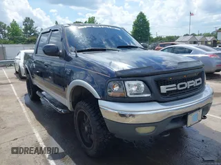 2001 Ford F-150 XLT z VIN 1FTRW08LX1KD56482, wystawiony jako IAAI lot #42155153 z przebiegiem 340 009 mil mil oraz . Historia ofert i sprzedaży dostępna na DreamBid. Obrazek 13.
