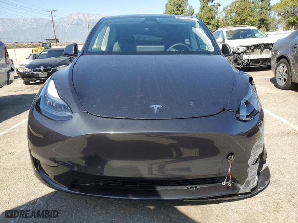 2025 Tesla Model Y Long Range with VIN 7SAYGDEE9SF302274, listed as a Copart auction lot 46942325 with 238 mi miles and Salvage Title. Bid and sale history available at carsss.com. Image 5.