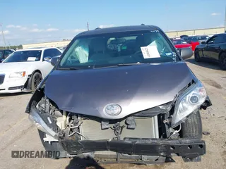 2016 Toyota Sienna LE AAS with VIN 5TDKK3DC1GS714039, listed as a IAAI auction lot 41868423 with 150,817 mi miles. Bid and sale history available at carsss.com. Image 12.