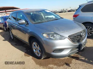 2015 Mazda CX-9 Touring with VIN JM3TB3CA7F0451472, listed as a IAAI auction lot 41559364 with 126,797 mi miles. Bid and sale history available at carsss.com. Image 1.