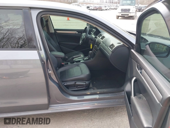 2015 Volkswagen Passat 1.8T Limited Edition with VIN 1VWAT7A31FC049502, listed as a IAAI auction lot 41833759 with 121,099 mi miles. Bid and sale history available at carsss.com. Image 5.