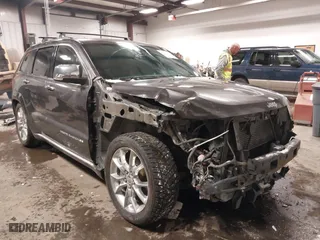 2014 Jeep Grand Cherokee Summit with VIN 1C4RJFJM1EC393067, listed as a IAAI auction lot 41501938 with 129,755 mi miles. Bid and sale history available at carsss.com. Image 1.