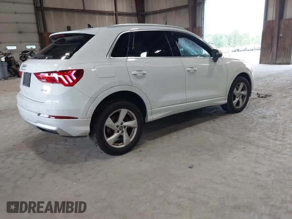 2020 Audi Q3 Premium with VIN WA1AECF3XL1090825, listed as a IAAI auction lot 42541577 with 32,432 mi miles and . Bid and sale history available at DreamBid. Image 4.