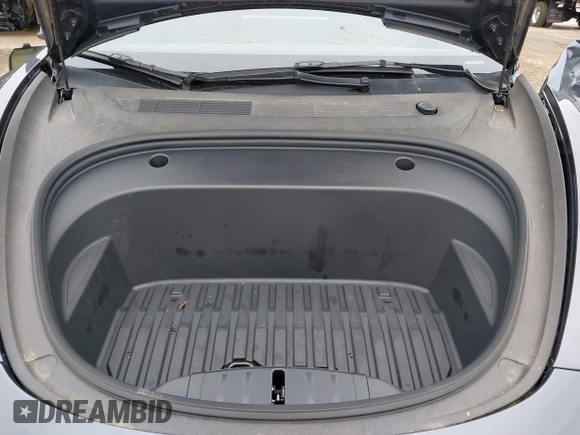 2023 Tesla Model 3 with VIN 5YJ3E1EA9PF673399, listed as a IAAI auction lot 42392643 with 7,571 mi miles and . Bid and sale history available at DreamBid. Image 10.
