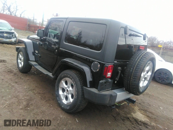 2014 Jeep Wrangler Sahara with VIN 1C4AJWBG9EL161712, listed as a IAAI auction lot 41839193 with 68,318 mi miles and . Bid and sale history available at DreamBid. Image 3.