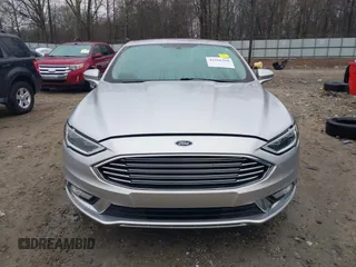 2017 Ford Fusion Titanium with VIN 3FA6P0SU9HR191490, listed as a IAAI auction lot 41560360 with 148,017 mi miles and . Bid and sale history available at DreamBid. Image 12.