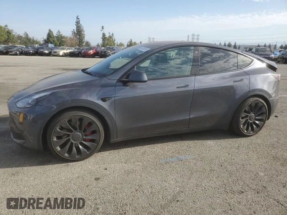 2022 Tesla Model Y Performance with VIN 7SAYGDEF3NF490643, listed as a Copart auction lot 46975825 with 50,792 mi miles and Salvage Title. Bid and sale history available at DreamBid. Image 1.
