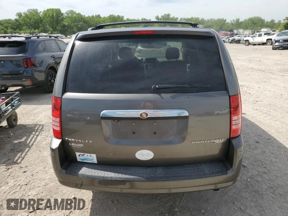 2010 Chrysler Town & Country Touring z VIN 2A4RR5D16AR415368, wystawiony jako Copart lot #55738015 z przebiegiem 127 871 mil mil oraz Szkoda całkowita • Salvage title. Historia ofert i sprzedaży dostępna na DreamBid. Obrazek 6.