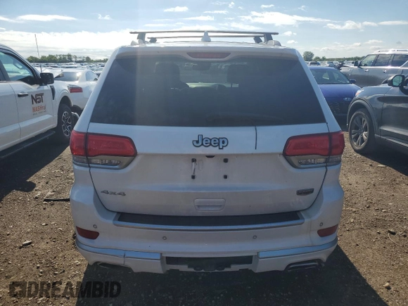 2017 Jeep Grand Cherokee Summit with VIN 1C4RJFJT9HC736624, listed as a Copart auction lot 62197245 with 217,469 mi miles and Salvage title. Bid and sale history available at DreamBid. Image 6.