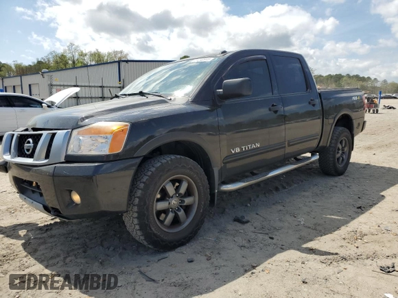 2015 Nissan Titan Pro-4X with VIN 1N6BA0EC1FN507491, listed as a Copart auction lot 51240915 with 165,510 mi miles and Salvage title. Bid and sale history available at DreamBid. Image 1.