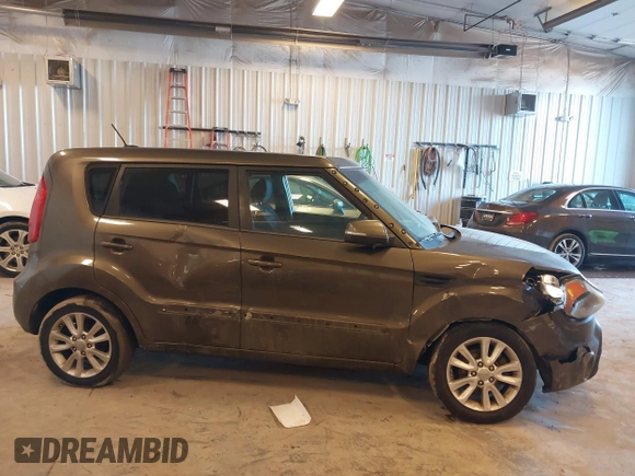 2012 Kia Soul + with VIN KNDJT2A64C7452975, listed as a IAAI auction lot 41635133 with 164,937 mi miles. Bid and sale history available at carsss.com. Image 13.