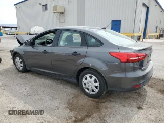 2017 Ford Focus S z VIN 1FADP3E21HL304026, wystawiony jako Copart lot #58786875 z przebiegiem 68 092 mil mil oraz Szkoda całkowita • Salvage title. Historia ofert i sprzedaży dostępna na DreamBid. Obrazek 2.