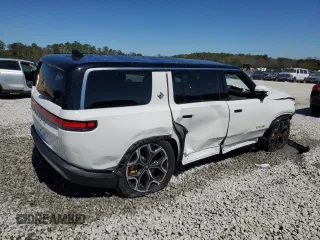 2024 Rivian R1S Adventure z VIN 7PDSGABA7RN034025, wystawiony jako Copart lot #49332795 z przebiegiem Nie podano mil oraz Szkody całkowita. Historia ofert i sprzedaży dostępna na DreamBid. Obrazek 3.