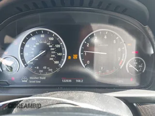2015 BMW 5 Series 535i xDrive with VIN WBA5B3C59FD545279, listed as a IAAI auction lot 41810032 with 122,936 mi miles. Bid and sale history available at carsss.com. Image 7.
