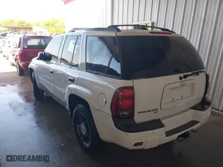 2006 Chevrolet TrailBlazer LS with VIN 1GNDS13S062235856, listed as a IAAI auction lot 41960738 with 112,706 mi miles. Bid and sale history available at carsss.com. Image 3.