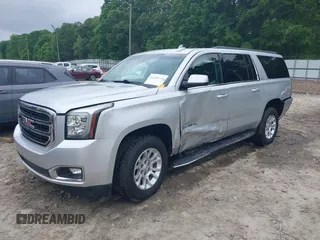 2019 GMC Yukon XL SLT z VIN 1GKS1GKC0KR242408, wystawiony jako IAAI lot #42144783 z przebiegiem Nie podano mil oraz . Historia ofert i sprzedaży dostępna na DreamBid. Obrazek 16.