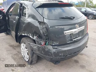 2015 Cadillac SRX with VIN 3GYFNAE30FS569009, listed as a IAAI auction lot 41718522 with 104,448 mi miles and . Bid and sale history available at DreamBid. Image 6.