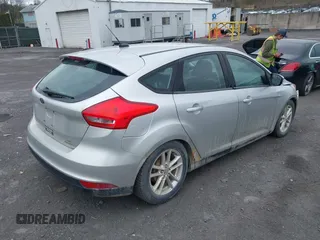 2015 Ford Focus SE with VIN 1FADP3K27FL245114, listed as a IAAI auction lot 42081284 with 90,527 mi miles. Bid and sale history available at carsss.com. Image 4.