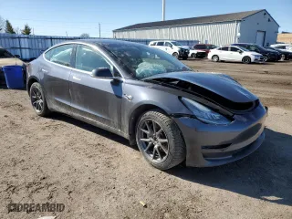 2019 Tesla Model 3 Long Range with VIN 5YJ3E1EB8KF452023, listed as a Copart auction lot 47389285 with 123,488 mi miles and Salvage Title. Bid and sale history available at carsss.com. Image 4.