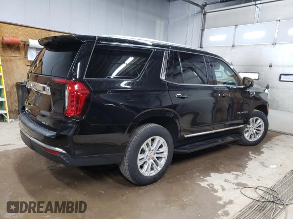 2024 GMC Yukon SLT with VIN 1GKS2BKDXRR331079, listed as a Copart auction lot 79533764 with 8,233 mi miles and Clean Title. Bid and sale history available at carsss.com. Image 3.