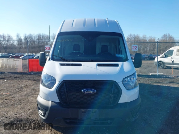 2023 Ford Transit Cargo z VIN 1FTBR3U80PKA07268, wystawiony jako IAAI lot #41815648 z przebiegiem 72 711 mil mil oraz . Historia ofert i sprzedaży dostępna na DreamBid. Obrazek 13.