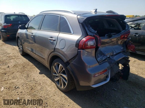 2018 Kia Niro Touring with VIN KNDCE3LC0J5131360, listed as a Copart auction lot 55943364 with 115,278 mi miles and Salvage Title. Bid and sale history available at carsss.com. Image 2.