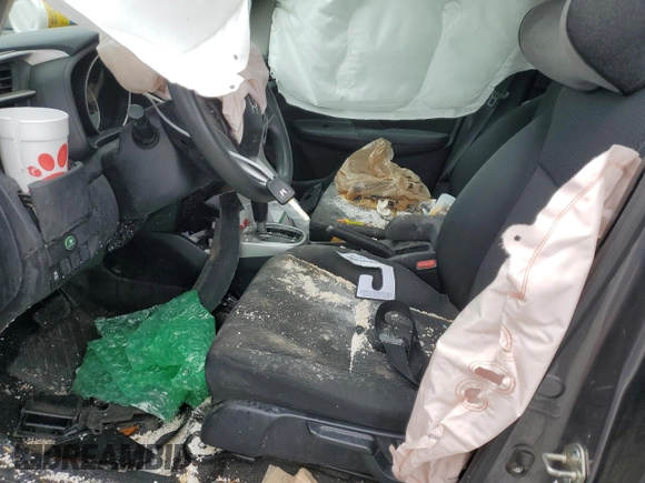 2020 Honda Fit LX z VIN 3HGGK5H45LM701620, wystawiony jako Copart lot #55937815 z przebiegiem Nie podano mil oraz Szkoda całkowita • Salvage title. Historia ofert i sprzedaży dostępna na DreamBid. Obrazek 7.
