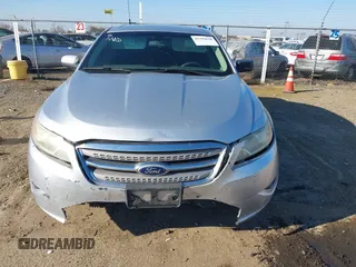 2011 Ford Taurus SE with VIN 1FAHP2DWXBG172965, listed as a IAAI auction lot 41395638 with 147,098 mi miles. Bid and sale history available at carsss.com. Image 6.