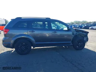 2019 Dodge Journey SE with VIN 3C4PDCBB0KT874812, listed as a IAAI auction lot 40220822 with 71,373 mi miles. Bid and sale history available at carsss.com. Image 14.