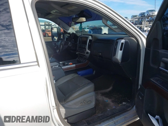 2015 GMC Sierra 2500HD available WiFi SLT with VIN 1GT12ZEG7FF167096, listed as a IAAI auction lot 41408317 with 152,969 mi miles. Bid and sale history available at carsss.com. Image 5.