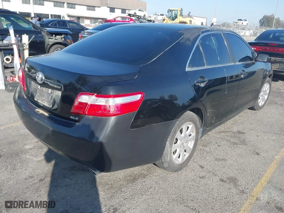 2008 Toyota Camry LE with VIN 4T1BK46K48U058681, listed as a IAAI auction lot 41194534 with 214,271 mi miles. Bid and sale history available at carsss.com. Image 4.