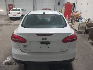 2018 Ford Focus SE with VIN 1FADP3F29JL312721, listed as a IAAI auction lot 41012098 with 126,214 mi miles. Bid and sale history available at carsss.com. Image 16.