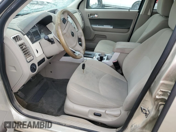 2010 Mercury Mariner with VIN 4M2CN8BG3AKJ09351, listed as a Copart auction lot 53737725 with 148,276 mi miles and Salvage title. Bid and sale history available at DreamBid. Image 7.