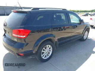 2017 Dodge Journey SXT with VIN 3C4PDCBG1HT523010, listed as a IAAI auction lot 42404624 with 198,519 mi miles and . Bid and sale history available at DreamBid. Image 4.