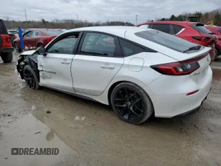 2023 Honda Civic Sport with VIN 19XFL2H86PE020441, listed as a Copart auction lot 47939545 with 69,664 mi miles and Salvage Title. Bid and sale history available at DreamBid. Image 2.