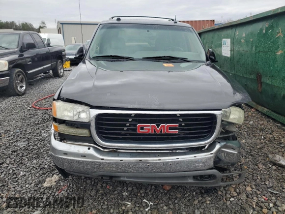 2005 GMC Yukon SLT z VIN 1GKEC13T35J119126, wystawiony jako Copart lot #47849455 z przebiegiem 301 785 mil mil oraz Szkoda całkowita • Salvage title. Historia ofert i sprzedaży dostępna na DreamBid. Obrazek 5.